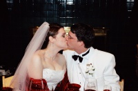 Kissing at the Head Table.jpg